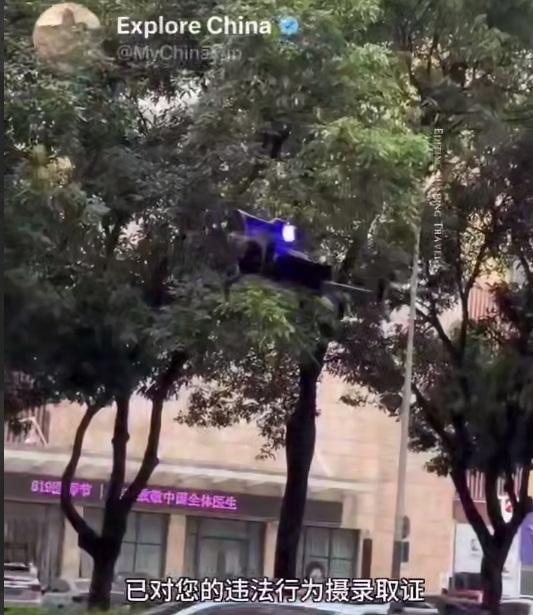 Видео: как в Китае дроны ловят нарушителей ПДД